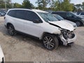 2022 Honda Pilot — photo 1 of 16 | VIN 5FNYF6H30NB067631