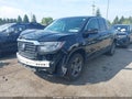 2023 Honda Ridgeline — photo 2 of 16 | VIN 5FPYK3F52PB068868