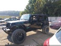 2010 Jeep Wrangler Unlimited — photo 14 of 18 | VIN 1J4BA6H16AL128937