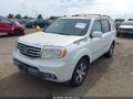 2013 Honda Pilot — photo 2 of 16 | VIN 5FNYF3H96DB015230