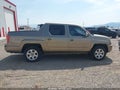 2009 Honda Ridgeline — photo 13 of 17 | VIN 5FPYK16419B108520