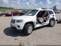 2015 Jeep Grand Cherokee — photo 2 of 16 | VIN 1C4RJFAG9FC827859