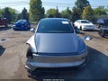 2026 Tesla Model Y — photo 12 of 16 | VIN 7SAYGDEE9TF689619