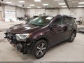 2018 Toyota RAV4 — photo 2 of 17 | VIN 2T3RFREV8JW842029