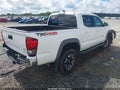 2018 Toyota Tacoma — photo 4 of 17 | VIN 5TFCZ5AN8JX139134