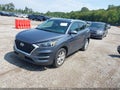 2021 Hyundai Tucson — photo 2 of 16 | VIN KM8J33A40MU382636