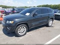 2015 Jeep Grand Cherokee — photo 2 of 16 | VIN 1C4RJEAG0FC735159