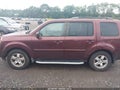 2011 Honda Pilot — photo 14 of 17 | VIN 5FNYF4H46BB040412