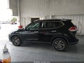 2015 Nissan Rogue — photo 14 of 16 | VIN 5N1AT2MV5FC858449