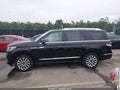 2022 Lincoln Navigator — photo 14 of 16 | VIN 5LMJJ2MT7NEL10036