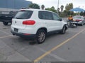 2014 Volkswagen Tiguan — photo 4 of 17 | VIN WVGAV3AX9EW554706