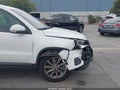 2014 Volkswagen Tiguan — photo 12 of 17 | VIN WVGAV3AX9EW554706