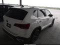 2023 Volkswagen Taos — photo 4 of 15 | VIN 3VVEX7B27PM301317