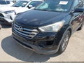 2014 Hyundai Santa Fe — photo 6 of 11 | VIN 5XYZU3LB3EG220096
