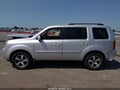 2009 Honda Pilot — photo 15 of 17 | VIN 5FNYF48669B017899