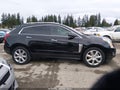 2015 Cadillac SRX — photo 12 of 16 | VIN 3GYFNFE33FS600170