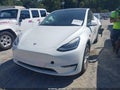 2021 Tesla Model Y — photo 2 of 14 | VIN 5YJYGDEE5MF081661