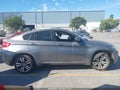2011 BMW X6 — photo 14 of 17 | VIN 5YMGZ0C58BLK14304