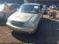 2004 Kia Sedona — photo 2 of 11 | VIN KNDUP131746578350
