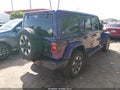 2023 Jeep Wrangler — photo 4 of 17 | VIN 1C4HJXEN9PW533856