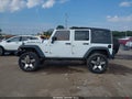 2013 Jeep Wrangler Unlimited — photo 14 of 20 | VIN 1C4BJWFG4DL664433