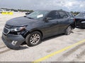 2018 Chevrolet Equinox — photo 2 of 17 | VIN 2GNAXJEV9J6334473