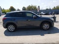 2016 Mazda CX-5 — photo 13 of 16 | VIN JM3KE2CY5G0682575