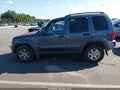 2002 Jeep Liberty — photo 14 of 16 | VIN 1J4GL48K52W271147