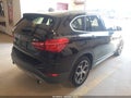 2017 BMW X1 — photo 4 of 16 | VIN WBXHT3Z35H4A57166