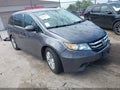 2015 Honda Odyssey — photo 1 of 15 | VIN 5FNRL5H24FB074887