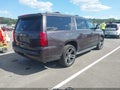 2015 Chevrolet Suburban — photo 4 of 16 | VIN 1GNSKJKC9FR697759