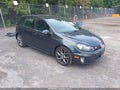 2013 Volkswagen GTI — photo 1 of 16 | VIN WVWHV7AJ7DW127934