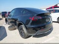 2023 Tesla Model Y — photo 3 of 17 | VIN 7SAYGDEE3PA107999