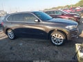 2014 BMW X5 — photo 13 of 16 | VIN 5UXKR0C56E0K49348