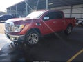 2017 Nissan Titan — photo 2 of 21 | VIN 1N6AA1E55HN561088