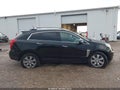 2014 Cadillac SRX — photo 13 of 16 | VIN 3GYFNEE39ES654159