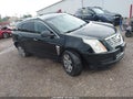 2014 Cadillac SRX — photo 1 of 16 | VIN 3GYFNEE39ES654159