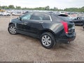 2014 Cadillac SRX — photo 3 of 16 | VIN 3GYFNEE39ES654159
