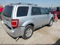 2010 Ford Escape — photo 4 of 12 | VIN 1FMCU0E77AKD45177