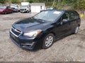2015 Subaru Impreza — photo 2 of 11 | VIN JF1GJAA66FH013257