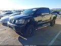 2007 Nissan Titan — photo 2 of 16 | VIN 1N6AA07A47N236211