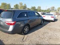 2012 Honda Odyssey — photo 4 of 16 | VIN 5FNRL5H4XCB021365
