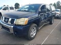2006 Nissan Titan — photo 2 of 16 | VIN 1N6BA07B56N543205