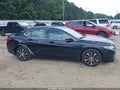 2015 Acura TLX — photo 13 of 19 | VIN 19UUB1F39FA001719