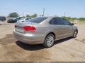 2015 Volkswagen Passat — photo 4 of 16 | VIN 1VWAT7A39FC014108
