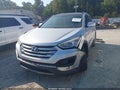 2016 Hyundai Santa Fe — photo 2 of 16 | VIN 5XYZW4LA5GG319660