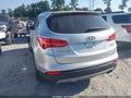 2016 Hyundai Santa Fe — photo 3 of 16 | VIN 5XYZW4LA5GG319660