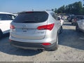 2016 Hyundai Santa Fe — photo 4 of 16 | VIN 5XYZW4LA5GG319660