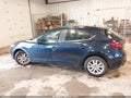 2016 Mazda 3 — photo 14 of 16 | VIN 3MZBM1K70GM324938