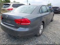 2015 Volkswagen Passat — photo 4 of 17 | VIN 1VWAT7A38FC010874